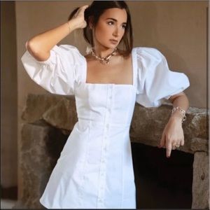 White mini dress with puff sleeves